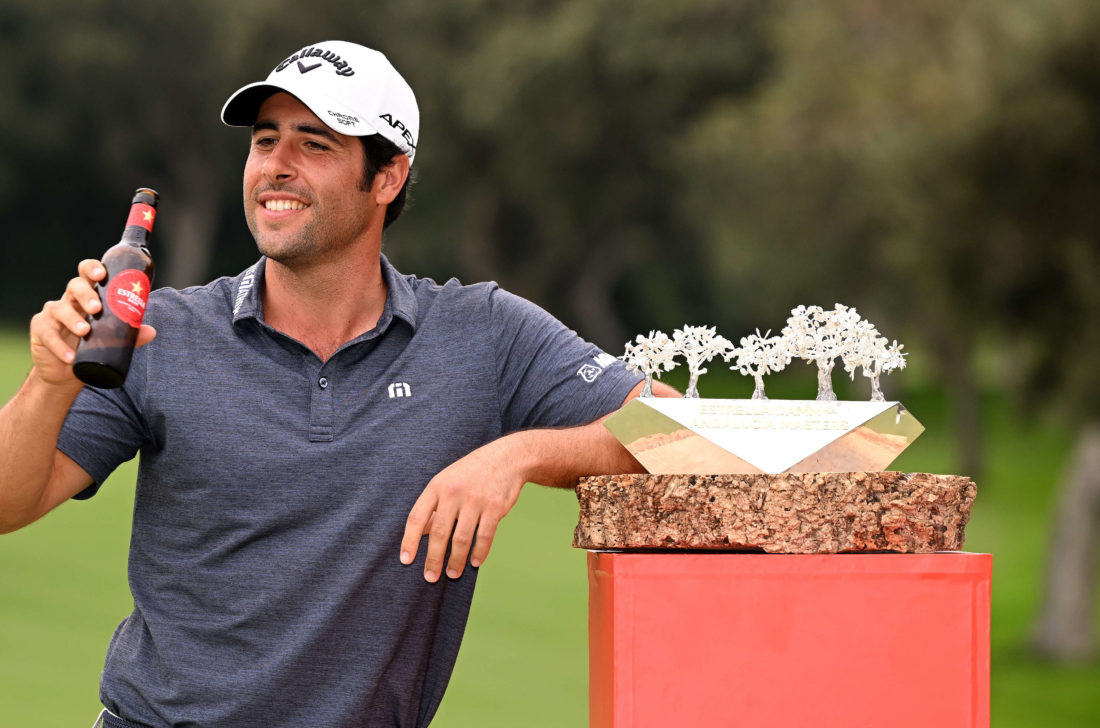 CADIZ, SPAIN - OCTOBER 16:tour news Adrian Otaegui of Spain celebrates with the winners trophy after the final round of the Estrella Damm N.A. Andalucía Masters at Real Club Valderrama on October 16, 2022 in Cadiz, Spain. (Photo by Ross Kinnaird/Getty Images)