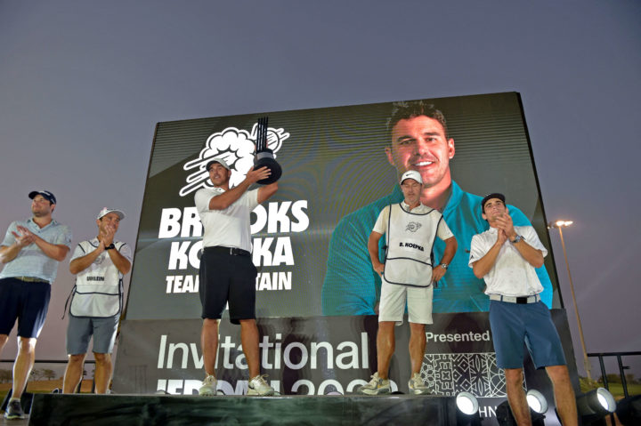 tour news US golfer Brooks Koepka (C) celebrates on the podium following his play-off win in the LIV Golf Invitational-Jeddah at the Royal Greens Golf Club on October 16, 2022. - Four-time major-winner Brooks Koepka secured the biggest payday of his career with a $4 million play-off win over close friend Peter Uihlein on the Saudi-funded LIV Golf breakaway tour. (Photo by Amer HILABI / AFP)tour news (Photo by AMER HILABI/AFP via Getty Images)