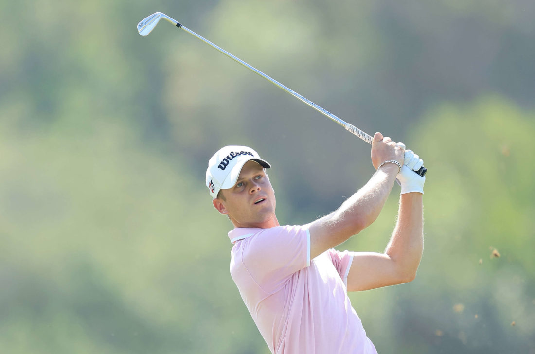 DUBAI, UNITED ARAB EMIRATES - NOVEMBER 17: Hurly Long of Germany plays his second shot on the third hole during the first round of the DP World Tour Championship on the Earth Course at Jumeirah Golf Estates on November 17, 2022 in Dubai, United Arab Emirates.tour news (Photo by David Cannon/Getty Images)