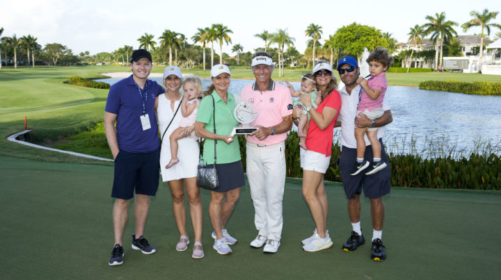 BOCA RATON, FLORIDA - NOVEMBER 06: Bernhard Langer of Germany celebrates with the trophy and his family on the 18th green during the final round of the TimberTech Championship at Royal Palm Yacht & Country Club on November 06, 2022 in Boca Raton, Florida. tour news (Photo by Raj Mehta/Getty Images)