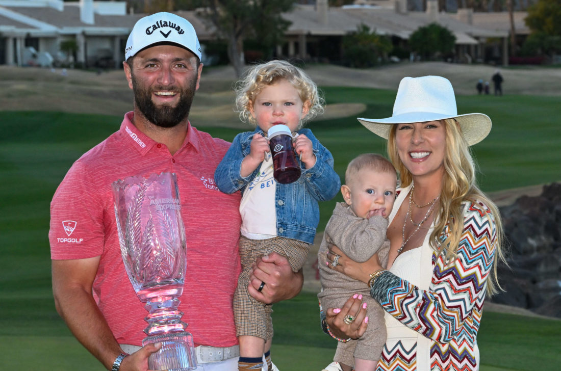 LA QUINTA, CA - JANUARY 22: Jon Rahm (ESP) is joined by his family on the green on 18 after winning The American Express Golf Tournament at the PGA West Pete Dye Stadium Course on January 22, 2023 in La Quinta, CA. tour news (Photo by Ken Murray/Icon Sportswire)