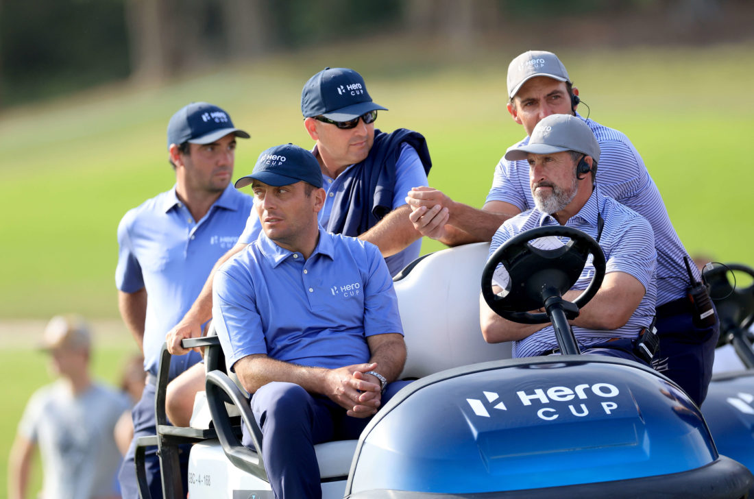 ABU DHABI, UNITED ARAB EMIRATES - JANUARY 15: Francesco Molinari of Italy and The captain of the Continent of Europe Team watches the golf on the 17th green with Jose Maria Olazabal of Spain and his brother Edoardo Molinari during the final day's singles matches on Day Three of the Hero Cup at Abu Dhabi Golf Club on January 15, 2023 in Abu Dhabi, United Arab Emirates. tour news (Photo by David Cannon/Getty Images)