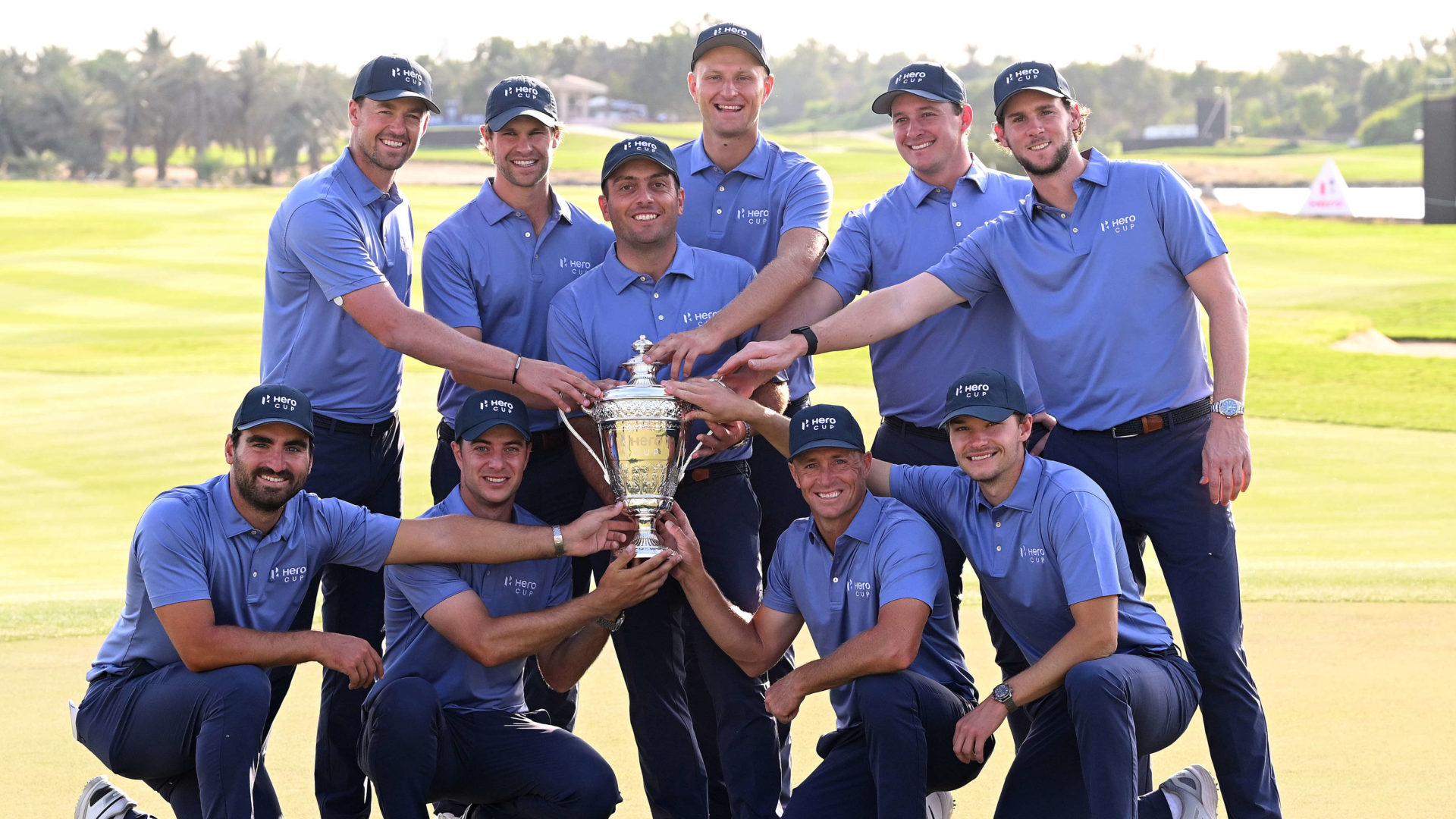ABU DHABI, UNITED ARAB EMIRATES - JANUARY 15: The Continental Europe team celebrate with the Hero Cup trophy after the singles matches on day three of the Hero Cup at Abu Dhabi Golf Club on January 15, 2023 in Abu Dhabi, United Arab Emirates. tour news (Photo by Ross Kinnaird/Getty Images)