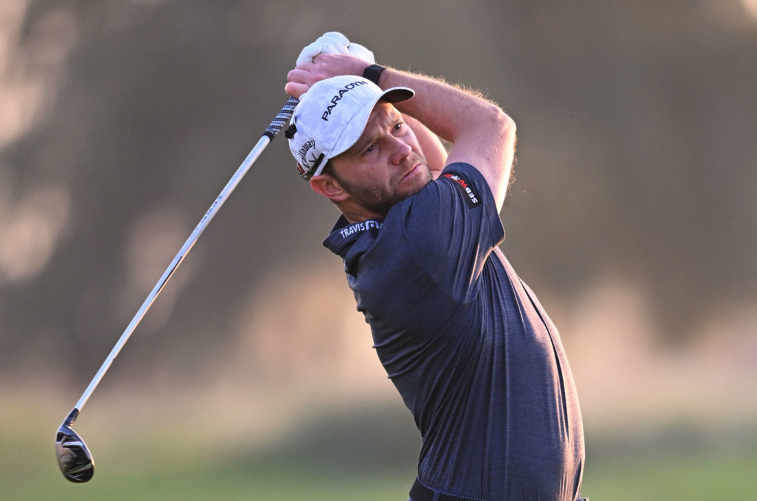 ABU DHABI, UNITED ARAB EMIRATES - JANUARY 20: Maximilian Kieffer of Germany plays his second shot on the eleventh hole during day two of the Abu Dhabi HSBC Championship at Yas Links Golf Course on January 20, 2023 in Abu Dhabi, United Arab Emirates. tour news (Photo by Ross Kinnaird/Getty Images)