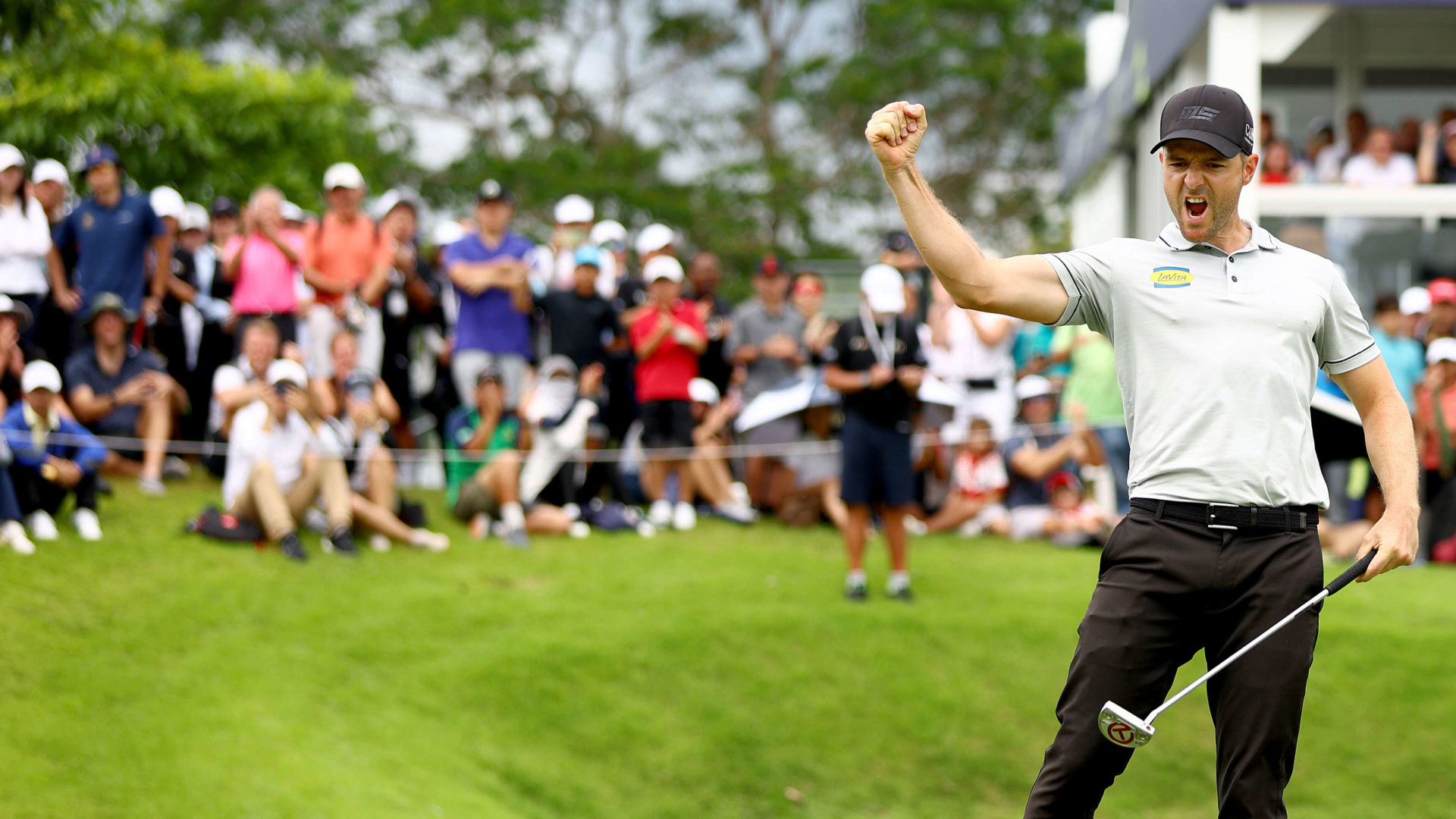 SINGAPORE, SINGAPORE - FEBRUARY 12: Marcel Schneider of Germany celebrates after scoring eagle on the 18th hole during Day Four of the Singapore Classic at Laguna National Golf Resort Club on February 12, 2023 in Singapore. tour news (Photo by Yong Teck Lim/Getty Images)