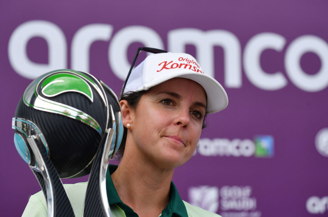 17/03/2023. tour news Ladies European Tour 2023. Aramco Team Series Presented By Public Investment Fund - Singapore, Laguna National, Singapore. 16-18 March. Christine Wolf of Austria poses with the trophy the as Team Wolf win the team event by one shot. Credit: Mark Runnacles/LET