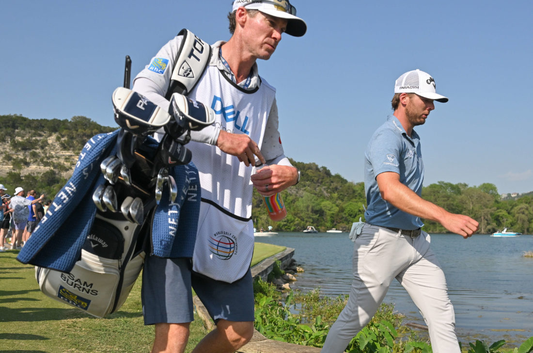 AUSTIN, TEXAS - MARCH 26: Sam Burns and his caddie, Travis Perkins, walk along the 13th hole during the final day of the World Golf Championships-Dell Technologies Match Play at Austin Country Club on March 26, 2023 in Austin, Texas. (Photo by Ben Jared/PGA TOUR via Getty Images) tour news
