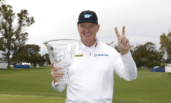 NEWPORT BEACH, CALIFORNIA - MARCH 19: Ernie Els of South Africa celebrates as he poses with the winner's trophy during the final round of the Hoag Classic at Newport Beach Country Club on March 19, 2023 in Newport Beach, California. (Photo by Michael Owens/Getty Images) tour news