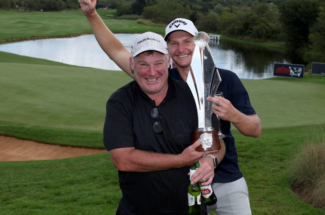 JOHANNESBURG, SOUTH AFRICA - MARCH 26: Nick Bachem of Germany poses with Jonsson Workwear Open trophy with his caddie Steve Rawlinson during Day Four of the Jonsson Workwear Open at The Club at Steyn City on March 26, 2023 in South Africa. (Photo by Warren Little/Getty Images) tour news