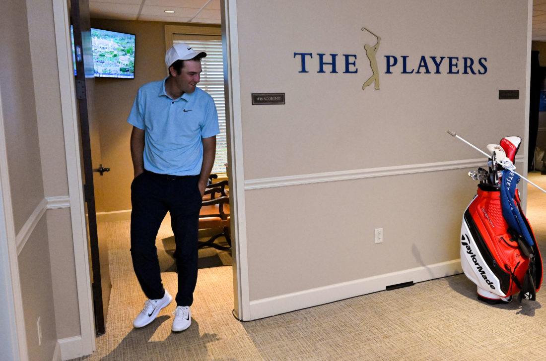 PONTE VEDRA BEACH, FLORIDA - MARCH 12: Scottie Scheffler reacts after winning and signing his scorecard during the final round of THE PLAYERS Championship at Stadium Course at TPC Sawgrass on March 12, 2023 in Ponte Vedra Beach, Florida. (Photo by Ben Jared/PGA TOUR via Getty Images) tour news