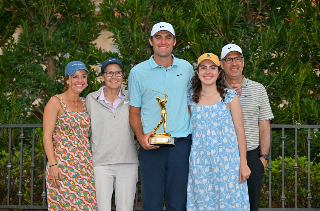 PONTE VEDRA BEACH, FLORIDA -tour news MARCH 12: Scottie Scheffler poses for a photo with his wife Meredith and immediate family after winning during the trophy ceremony during the final round of THE PLAYERS Championship at Stadium Course at TPC Sawgrass on March 12, 2023 in Ponte Vedra Beach, Florida. (Photo by Ben Jared/PGA TOUR via Getty Images)
