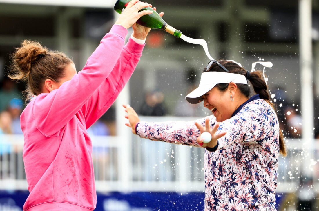 THE WOODLANDS, TEXAS - APRIL 23: Lilia Vu of the United States is sprayed with champagne in celebration of winning on the number 18 first-playoff hole against Angel Yin (not pictured) of the United States during the final round of The Chevron Championship at The Club at Carlton Woods on April 23, 2023 in The Woodlands, Texas. (Photo by Carmen Mandato/Getty Images) tour news