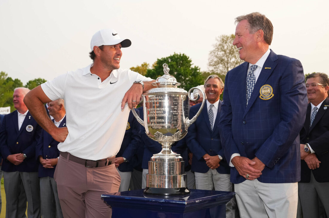 ROCHESTER, NY - MAY 21: Brooks Koepka smiles with The Wanamaker Trophy alongside PGA of America President, John Lindert, PGA after the final round of the PGA Championship at Oak Hill Country Club on Sunday, May 21, 2023 in Rochester, New York. (Photo by Darren Carroll/PGA of America via Getty Images) tour news