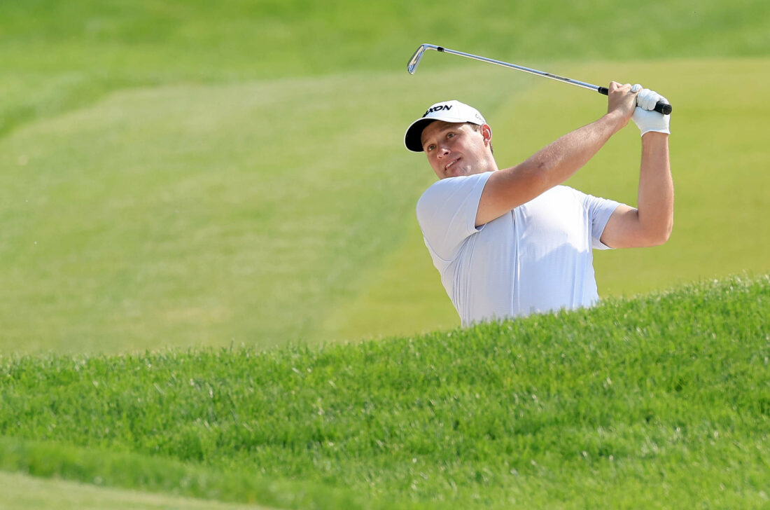 ROCHESTER, NEW YORK - MAY 21: Sepp Straka of Austria plays his second shot on the 18th hole during the final round of the 2023 PGA Championship at Oak Hill Country Club on May 21, 2023 in Rochester, New York. (Photo by David Cannon/Getty Images) tour news