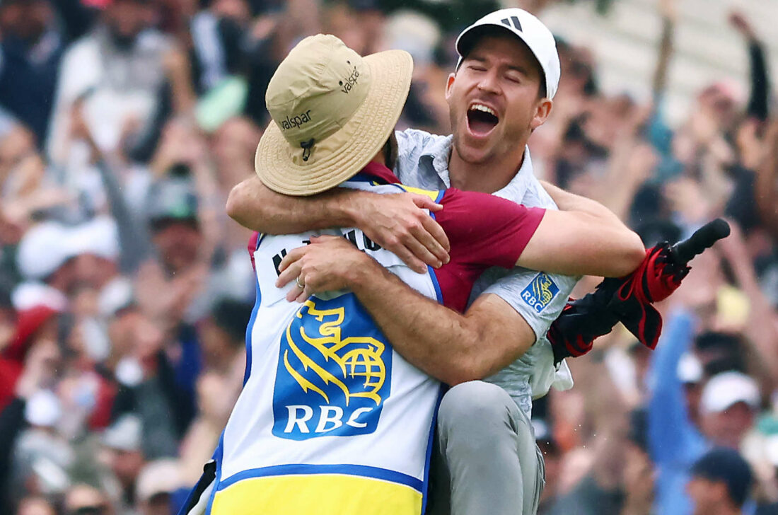 TORONTO, ONTARIO - JUNE 11: Nick Taylor of Canada celebrates with his caddie after making an eagle putt on the 4th playoff hole to win the RBC Canadian Open at Oakdale Golf & Country Club on June 11, 2023 in Toronto, Ontario. tour news (Photo by Vaughn Ridley/Getty Images) tour news