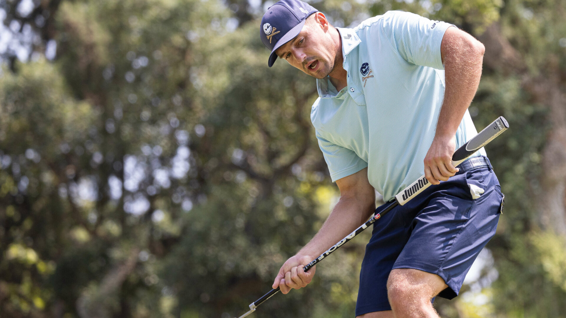 Captain Bryson DeChambeau of Crushers GC reacts to his putt on the 12th green during the second round of LIV Golf Andalucía at the Real Club Valderrama on Saturday, July 01, 2023 in San Roque, Spain. (Photo by Chris Trotman/LIV Golf)