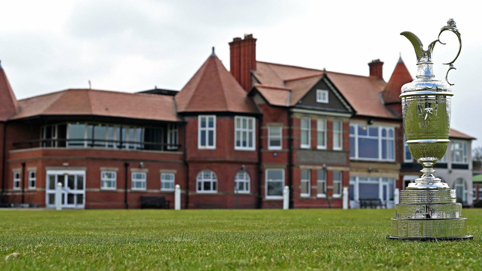 The Claret Jug, the trophy for the Champion Golfer of the Year, is pictured on the first fairway, during a preview ahead of the 151st British Open Golf Championship at Royal Liverpool Golf Course in Hoylake, north west England on April 19, 2023. - The Royal Liverpool Golf Course will host The 151st Open from July 20 to 23, 2023. (Photo by Paul ELLIS / AFP) / EDITORIAL USE ONLY (Photo by PAUL ELLIS/AFP via Getty Images)