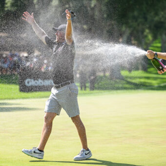 CADIZ, SPAIN - JULY 2: Talor Gooch of RangeGoats GC is sprayed with champagne by his caddy after sinking a birdie putt on the 18th hole and wins the LIV Golf - Andalucia at Real Club Valderrama on July 2, 2023 in Cadiz, Spain. (Photo by Octavio Passos/Getty Images) tour news