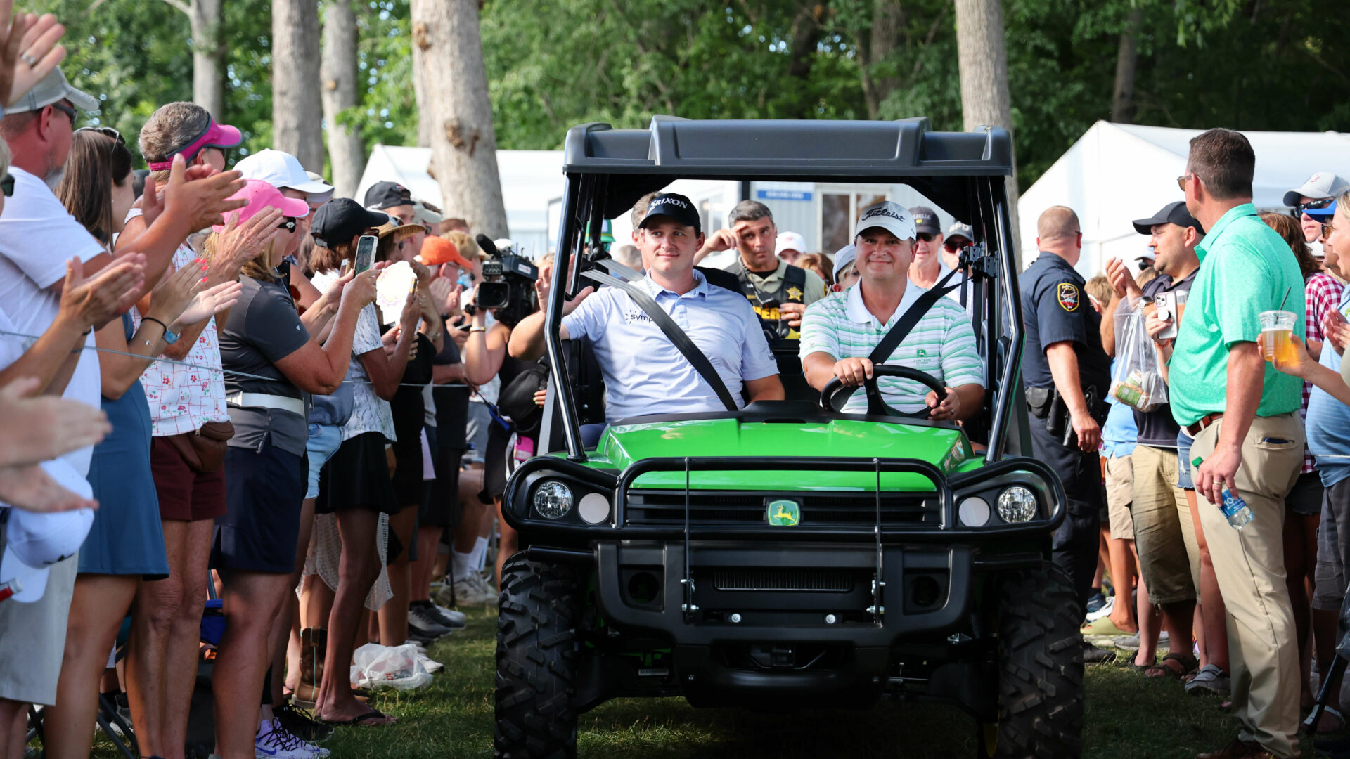 SILVIS, ILLINOIS - JULY 09:tour news Sepp Straka of Austria is driven to the 18th hole for the trophy ceremony after winning the John Deere Classic at TPC Deere Run on July 09, 2023 in Silvis, Illinois. (Photo by Michael Reaves/Getty Images) tour news