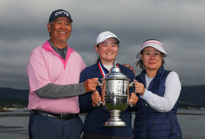 PEBBLE BEACH, CALIFORNIA - JULY 09: Allisen Corpuz (C) of the United States celebrates with the Harton S. Semple Trophy alongside her father Marcs Corpuz (L) and mother May Corpuz (R) after winning the 78th U.S. Women's Open at Pebble Beach Golf Links on July 09, 2023 in Pebble Beach, California. (Photo by Harry How/Getty Images) tour news