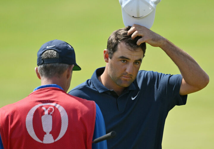 US golfer Scottie Scheffler completes the course on day one of the 151st British Open Golf Championship at Royal Liverpool Golf Course in Hoylake, north west England on July 20, 2023. The 151st Open at The Royal Liverpool Golf Course is set to run until July 23. (Photo by Glyn KIRK / AFP) / EDITORIAL USE ONLY (Photo by GLYN KIRK/AFP via Getty Images)