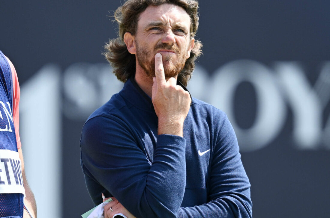 HOYLAKE, ENGLAND - JULY 20: Tommy Fleetwood of England looks on alongside caddy Ian Finnisduring Day One of The 151st Open at Royal Liverpool Golf Club on July 20, 2023 in Hoylake, England. (Photo by Stuart Franklin/R&A/R&A via Getty Images)