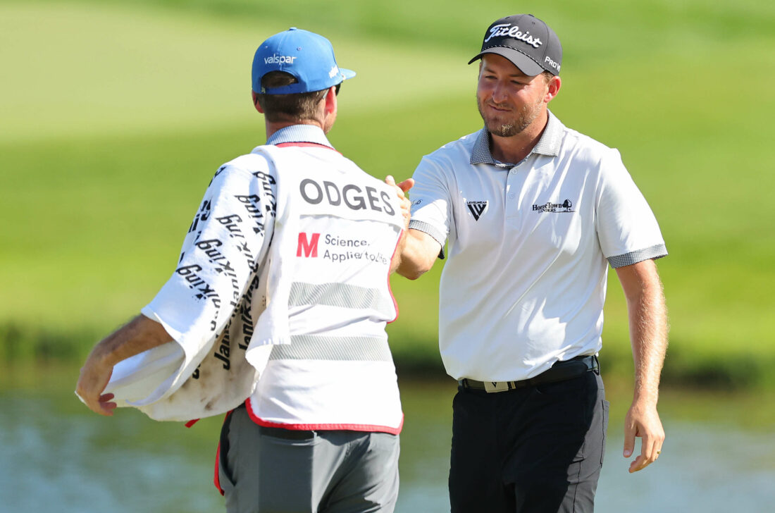 BLAINE, MINNESOTA - JULY 30: Lee Hodges of the United States celebrates winning on the 18th green with caddie Andrew Medley during the final round of the 3M Open at TPC Twin Cities on July 30, 2023 in Blaine, Minnesota. (Photo by Stacy Revere/Getty Images) tour news