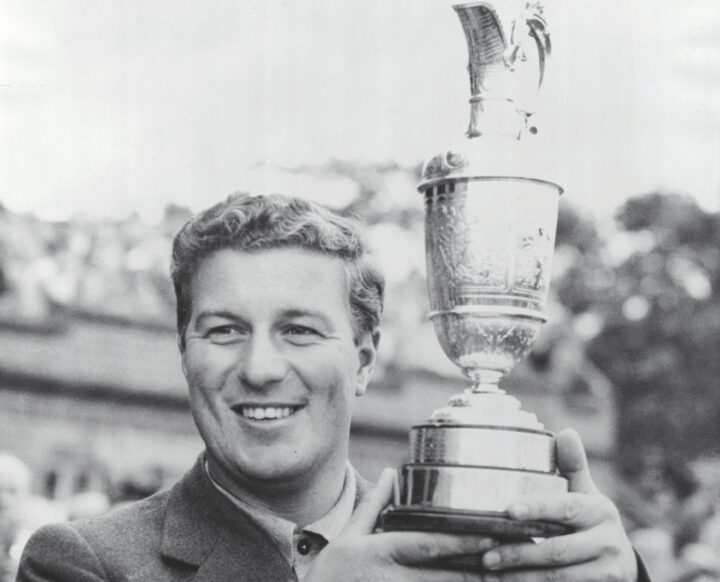 (Original Caption) Thomson Takes British Open 3rd Time in Row. Holylake, England: Peter Thomson of Australia jubilantly holds his trophy after winning the British Open Golf Championship for the third successive year at the Royal Liverpool Golf Club here on Friday. His total of 286, though four over par, was three strokes ahead of Belgium's Flory van Donck for the 72 holes. This was the first time since the Open became a 72-hole contest in 1892 that a golfer had won the title three years in a row.