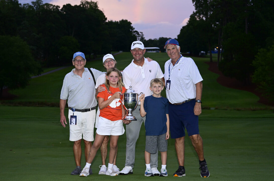 GREENSBORO, NORTH CAROLINA - AUGUST 06: Lucas Glover of the United States poses with his family after winning the Wyndham Championship at Sedgefield Country Club on August 06, 2023 in Greensboro, North Carolina. (Photo by Logan Whitton/Getty Images) tour news