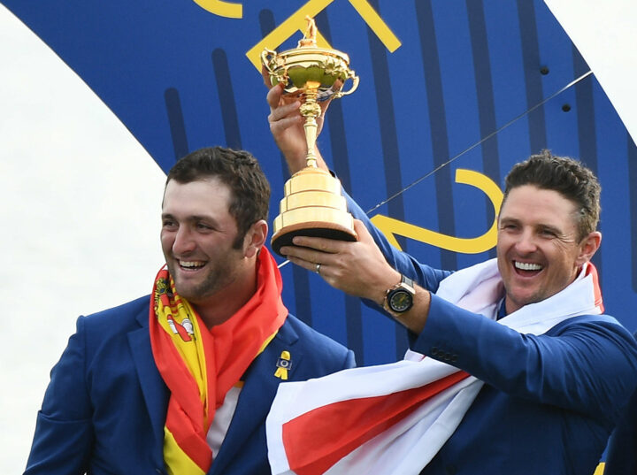 TOPSHOT - Europe's English golfer Justin Rose (R) holds the trophy next to Europe's Spanish golfer Jon Rahm after Europe won the 42nd Ryder Cup at Le Golf National Course at Saint-Quentin-en-Yvelines, south-west of Paris, on September 30, 2018. (Photo by FRANCK FIFE / AFP) (Photo credit should read FRANCK FIFE/AFP via Getty Images)