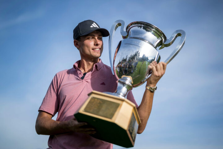 Sweden's Ludvig Aberg poses with the trophy after winning the European Tour's European Masters golf tournament in Crans Montana, western Switzerland on September 3, 2023. (Photo by Fabrice COFFRINI / AFP) (Photo by FABRICE COFFRINI/AFP via Getty Images)