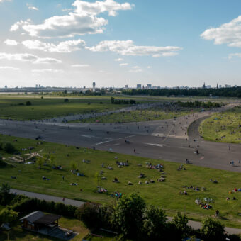 BERLIN, GERMANY - MAY 30: In an aerial view, people relax at Tempelhofer Feld public park during the coronavirus pandemic on May 30, 2021 in Berlin, Germany. While the pandemic is continuing in Germany, infection rates have come down sharply and the number of vaccinations is climbing steadily, allowing authorities to ease many lockdown measures and giving Germans hope that a return to normalcy is getting closer. (Photo by Christian Ender/Getty Images)