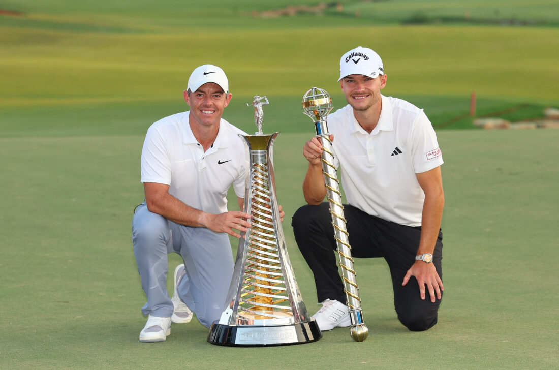DUBAI, UNITED ARAB EMIRATES - NOVEMBER 19: Race to Dubai Winner, Rory McIlroy of Northern Ireland and DP World Tour Championship Winner, Nicolai Hojgaard of Denmark pose with their trophies on the 18th green during Day Four of the DP World Tour Championship on the Earth Course at Jumeirah Golf Estates on November 19, 2023 in Dubai, United Arab Emirates. (Photo by Andrew Redington/Getty Images) tour news