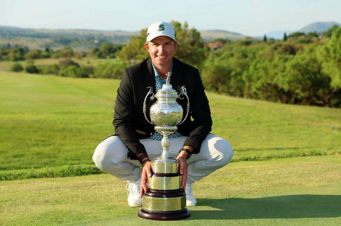 JOHANNESBURG, SOUTH AFRICA - DECEMBER 03: Dean Burmester of South Africa celebrates with the trophy after winning during day four of the Investec South African Open Championship at Blair Atholl Golf & Equestrian Estate on December 03, 2023 in Johannesburg, South Africa. (Photo by Luke Walker/Getty Images) tour news