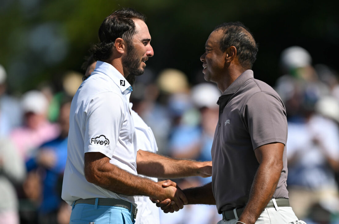 AUGUSTA, GEORGIA - APRIL 12: Tiger Woods shakes hands with Max Homa on the 18th green during the second round of Masters Tournament at Augusta National Golf Club on April 12, 2024 in Augusta, Georgia. (Photo by Ben Jared/PGA TOUR via Getty Images)