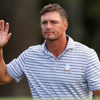 AUGUSTA, GEORGIA - APRIL 11: Bryson DeChambeau of the United States waves to the patrons on the 18th green during the first round of the 2024 Masters Tournament at Augusta National Golf Club on April 11, 2024 in Augusta, Georgia. (Photo by Andrew Redington/Getty Images)