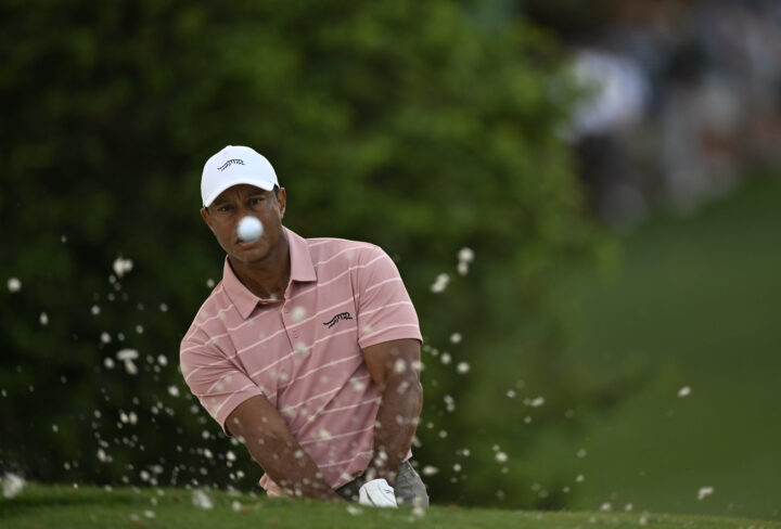 Tiger WOODS (USA) third shot from green side bunker 10th par 4 during first round US Masters 2024, Augusta National Golf Club,Augusta,Georgia, USA.