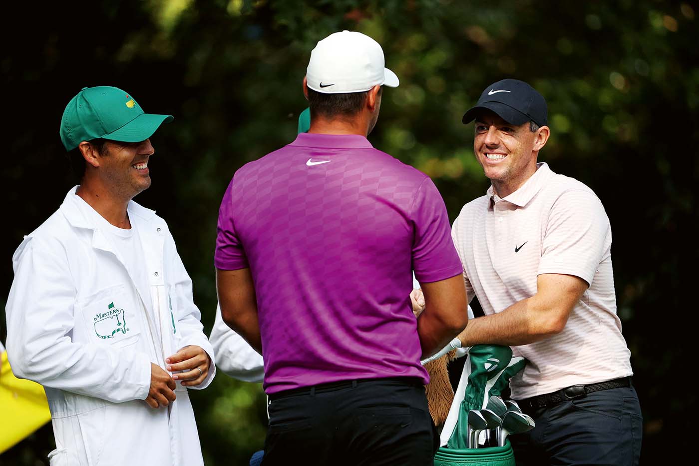 AUGUSTA, GEORGIA - NOVEMBER 15: Brooks Koepka of the United States talks with Rory McIlroy of Northern Ireland on the seventh tee during the final round of the Masters at Augusta National Golf Club on November 15, 2020 in Augusta, Georgia. (Photo by Patrick Smith/Getty Images)