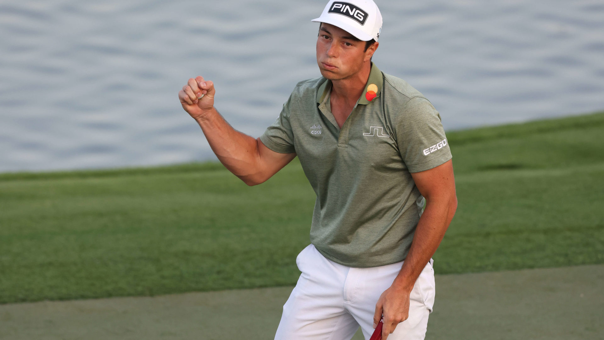 DUBAI, UNITED ARAB EMIRATES - JANUARY 30: Viktor Hovland of Norway celebrates winning on the 18th hole during the playoff against Richard Bland of England during day four of the Slync.io Dubai Desert Classic at Emirates Golf Club on January 30, 2022 in Dubai, United Arab Emirates - tour news (Photo by Luke Walker/Getty Images)