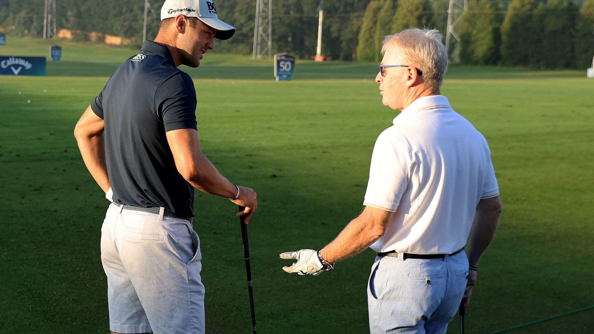 VIRGINIA WATER, ENGLAND - SEPTEMBER 08: Martin Kaymer of Germany interacts with Keith Pelley, CEO of the European Tour during Previews ahead of The BMW PGA Championship at Wentworth Golf Club on September 08, 2021 in Virginia Water, England. (Photo by Warren Little/Getty Images)