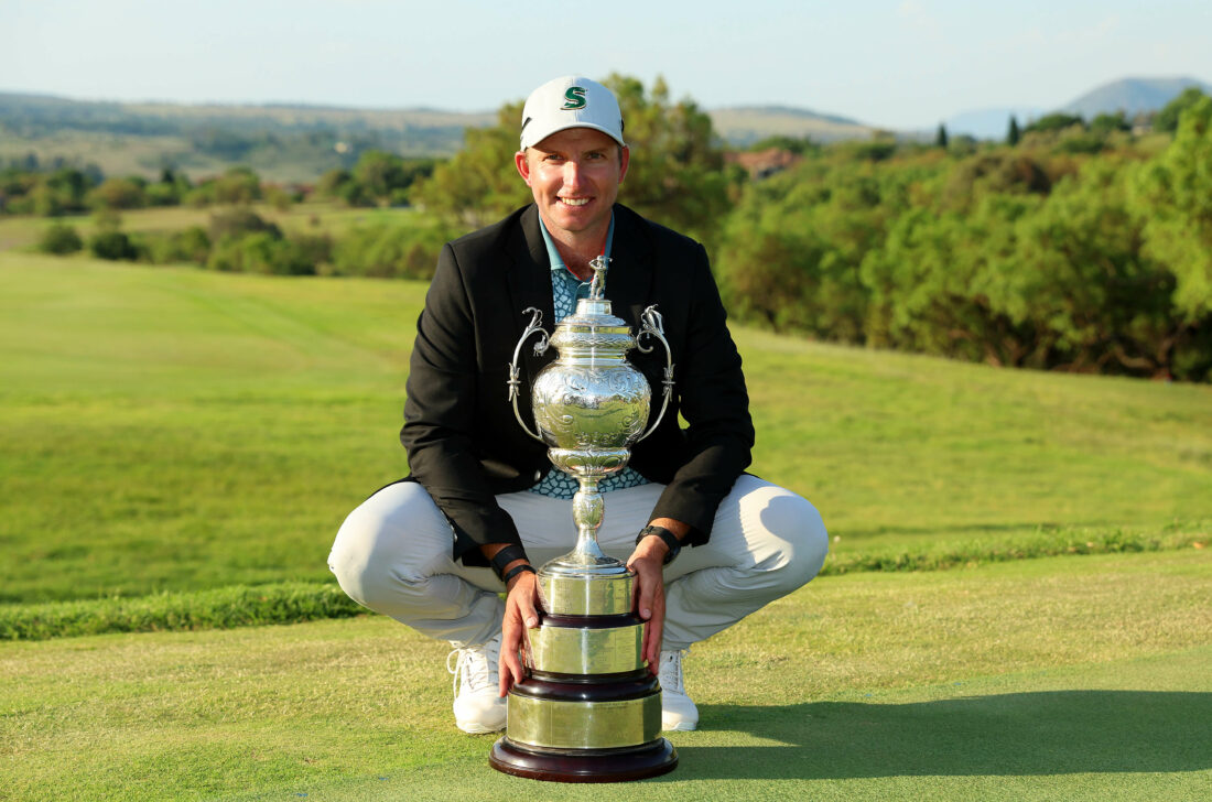 JOHANNESBURG, SOUTH AFRICA - DECEMBER 03: Dean Burmester of South Africa celebrates with the trophy after winning during day four of the Investec South African Open Championship at Blair Atholl Golf & Equestrian Estate on December 03, 2023 in Johannesburg, South Africa. (Photo by Luke Walker/Getty Images) tour news