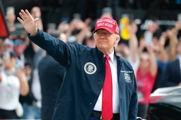 DAYTONA BEACH, FL - FEBRUARY 16: President of the United States Donald J. Trump waves to the crowd prior to the running of the NASCAR Cup Series Daytona 500 on February 16, 2025 at Daytona International Speedway in Daytona Beach, FL. (Photo by Jeff Robinson/Icon Sportswire via Getty Images)