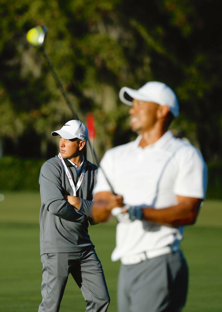 Chris Como und Tiger Woods