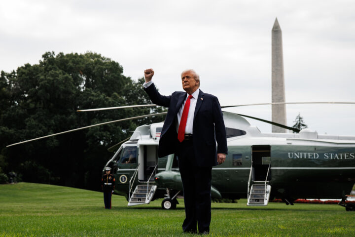 US President Donald Trump raises a fist on the South Lawn of the White House before boarding Marine One in Washington, DC, US, on Sunday, Sept. 7, 2025. Trump moved Friday to exempt graphite, tungsten, uranium, gold bullion and other metals from his country-based tariffs, while subjecting silicone products to the levies. Photographer: Samuel Corum/Sipa/Bloomberg via Getty Images