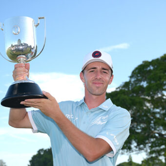 BRISBANE, AUSTRALIA - NOVEMBER 30: David Puig of Spain holds up the Joe Kirkwood Cup after victory on day four of the BMW Australian PGA Championship 2025 at Royal Queensland Golf Club on November 30, 2025 in Brisbane, Australia. (Photo by Bradley Kanaris/Getty Images)
