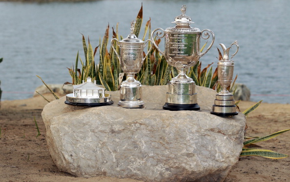 ABU DHABI, UNITED ARAB EMIRATES - JANUARY 20: A unique collection of trophies The golfing world's four Major trophies left to right - The Masters, The US Open, The US PGA and Open Championship Trophies during the first round of the 2011 Abu Dhabi HSBC Golf Championship to be held at the Abu Dhabi Golf Club on January 20, 2011 in Abu Dhabi, United Arab Emirates. (Photo by David Cannon/Getty Images)
