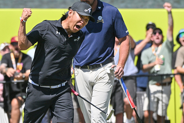 4Aces GC player Anthony Kim from the USA reacts after taking the lead on the final day of the LIV Golf Adelaide tournament at The Grange Golf Club in Adelaide on February 15, 2026. (Photo by Brenton Edwards / AFP via Getty Images) / -- IMAGE RESTRICTED TO EDITORIAL USE - STRICTLY NO COMMERCIAL USE --