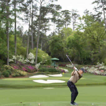 Masters champion Bernhard Langer of Germany plays a stroke from the No. 12 tee during a practice round prior to the Masters at Augusta National Golf Club, Sunday, April 05, 2026.