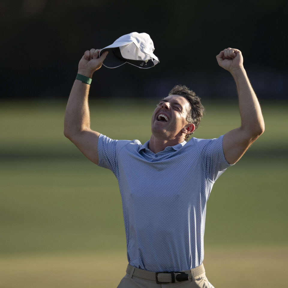 Masters champion Rory McIlroy of Northern Ireland celebrates on No. 18 with clenched fists after his back-to-back victory during the final round of the Masters at Augusta National Golf Club, Sunday, April 12, 2026.