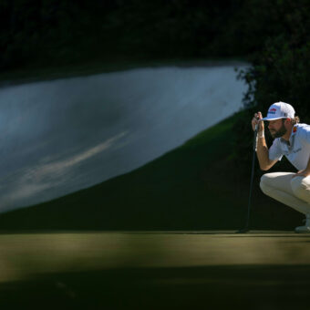 Cameron Young of the United States lines up a putt on the No. 13 green during the third round of the Masters at Augusta National Golf Club, Saturday, April 11, 2026.